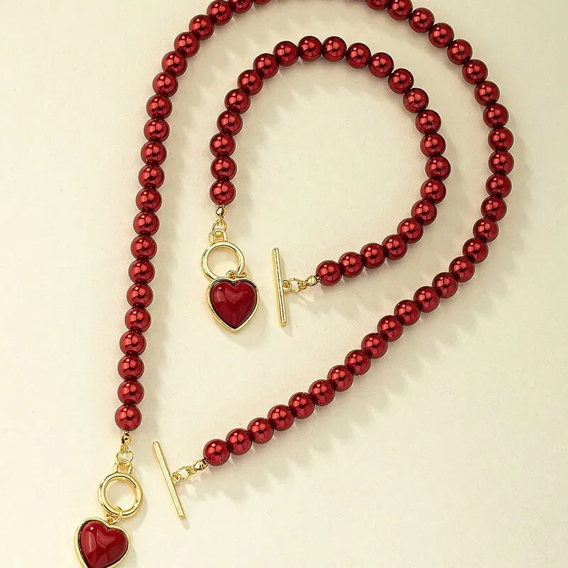 Halsband och armband med hjärta