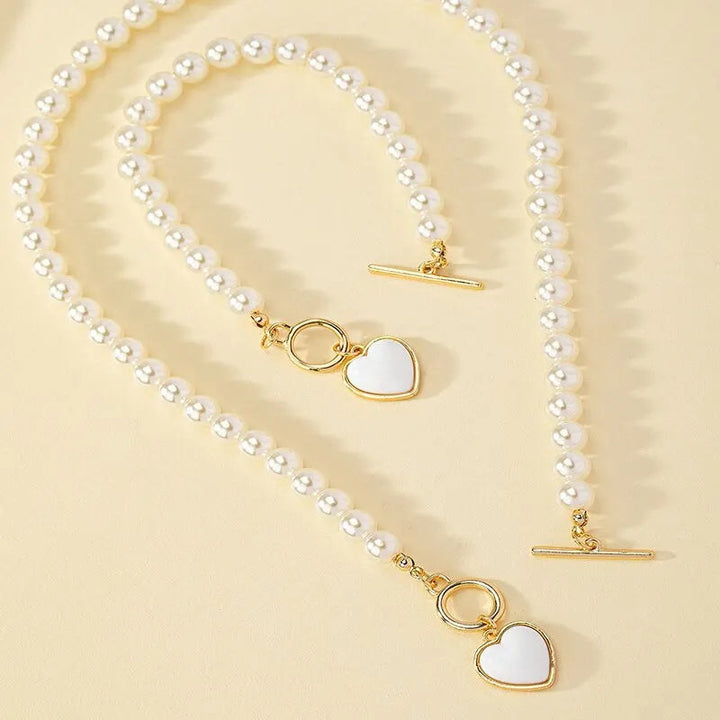 Halsband och armband med hjärta