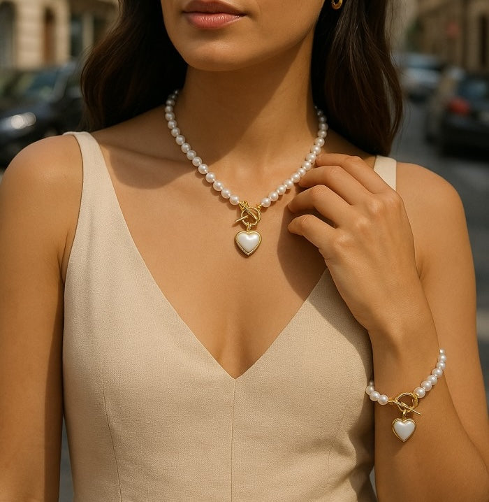 Halsband och armband med hjärta