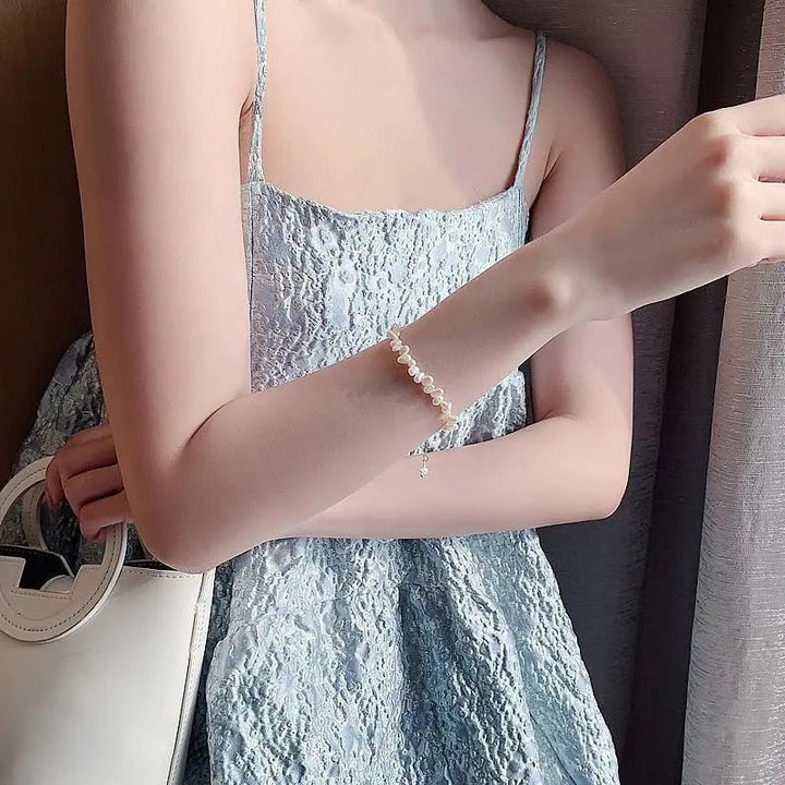 Liv Armband med Oregelbundna Pärldetaljer