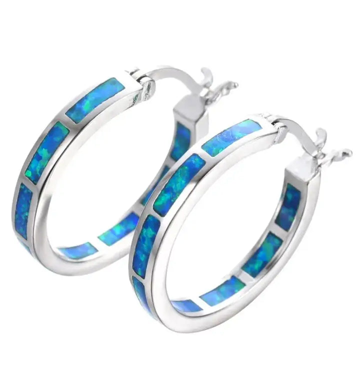 Eleganta Cirkelörhängen med Blå Opal